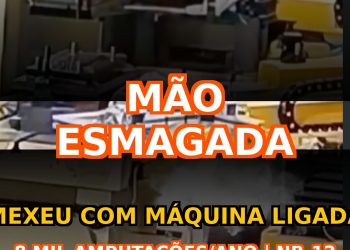 Trabalhador com mão esmagada em máquina industrial ligada - acidente grave por não desligar equipamento antes de mexer
